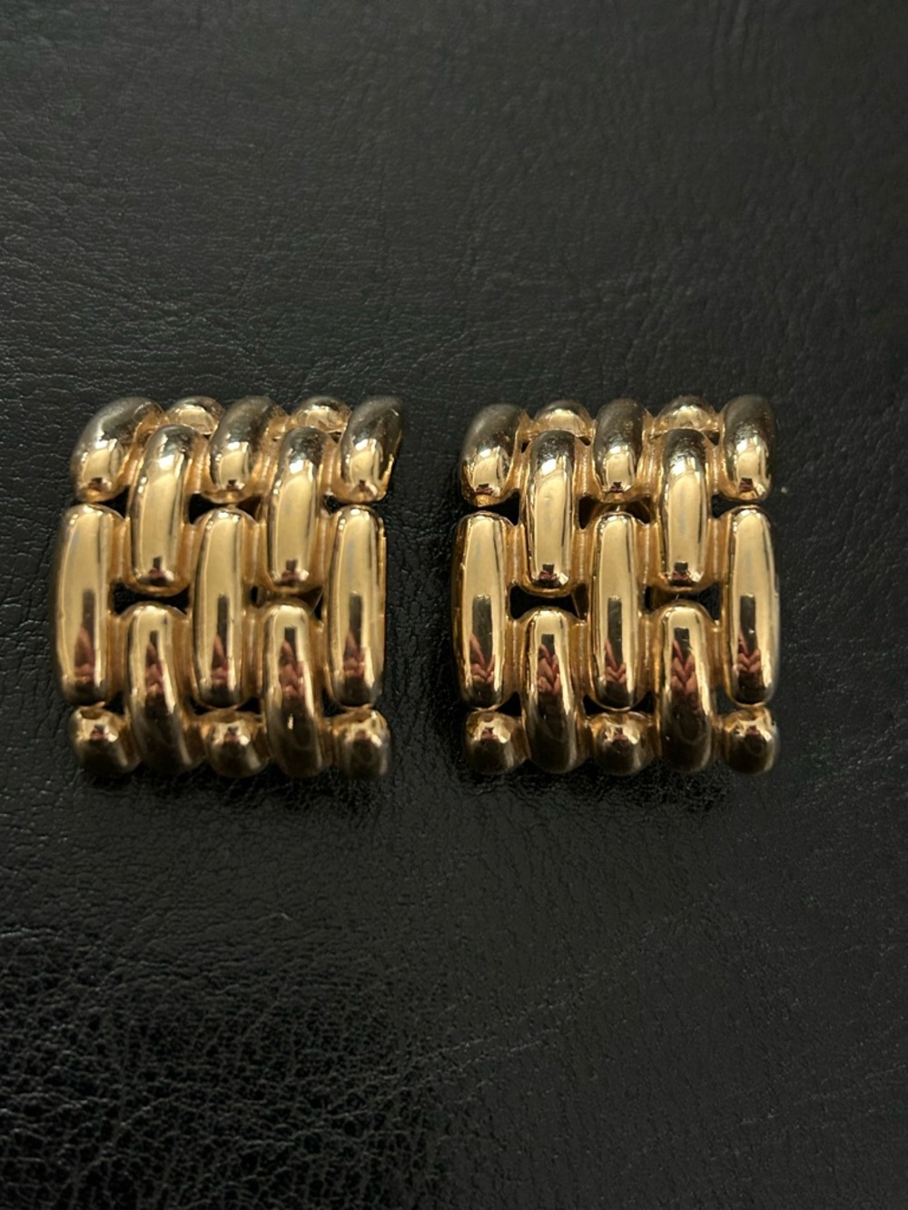 Vintage Givenchy gold basket weave chunky clip on earrings. Signed.